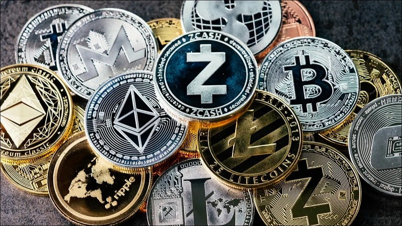Overlapping gold and silver cryptocurrency coins